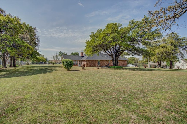 view of yard featuring fence