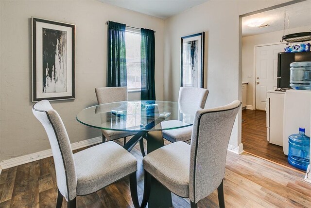 1115 W Eufaula St, Norman, OK 73069 - dining area featuring wood finished floors and baseboards