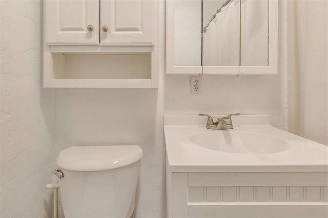 1115 W Eufaula St, Norman, OK 73069 - bathroom featuring toilet and vanity