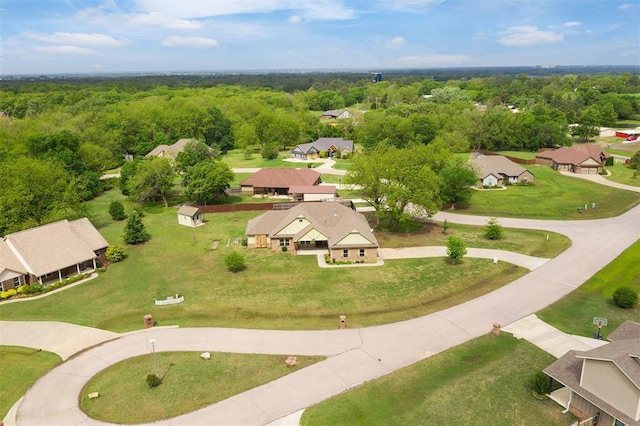 19066 Charleston Loop, Shawnee, OK 74801 - aerial perspective of suburban area with a heavily wooded area