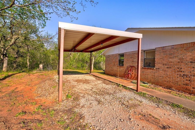 view of yard featuring a detached carport