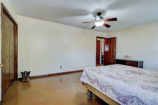 bedroom with concrete floors, a ceiling fan, and baseboards