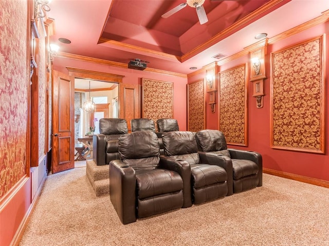3116 Sycamore Dr, Moore, OK 73160 - cinema room with crown molding, light colored carpet, visible vents, a tray ceiling, and a ceiling fan
