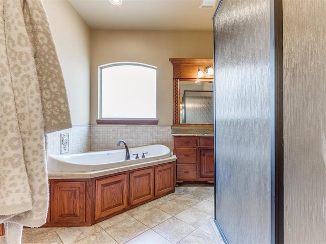 3116 Sycamore Dr, Moore, OK 73160 - bathroom featuring tile patterned floors, vanity, and a bath