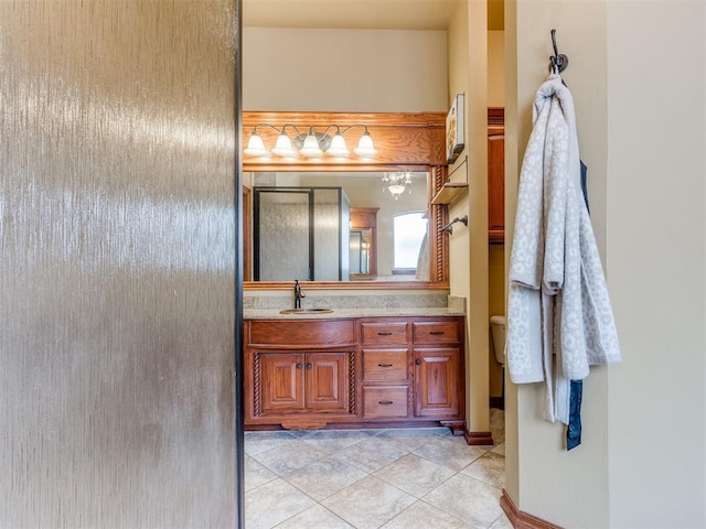 3116 Sycamore Dr, Moore, OK 73160 - bathroom featuring a walk in shower, toilet, vanity, and tile patterned flooring