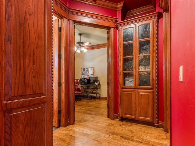 3116 Sycamore Dr, Moore, OK 73160 - corridor featuring crown molding, light wood finished floors, and baseboards