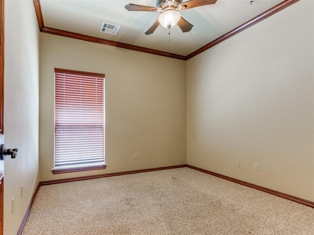 3116 Sycamore Dr, Moore, OK 73160 - empty room featuring visible vents, ornamental molding, ceiling fan, and carpet