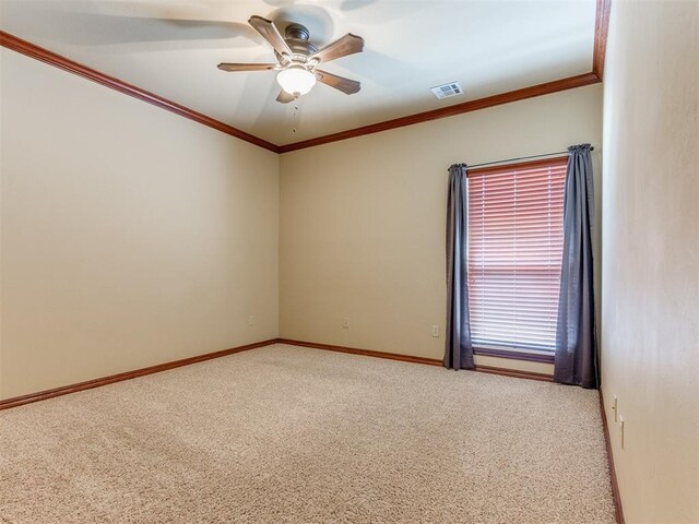 3116 Sycamore Dr, Moore, OK 73160 - carpeted empty room with ornamental molding, a ceiling fan, visible vents, and baseboards