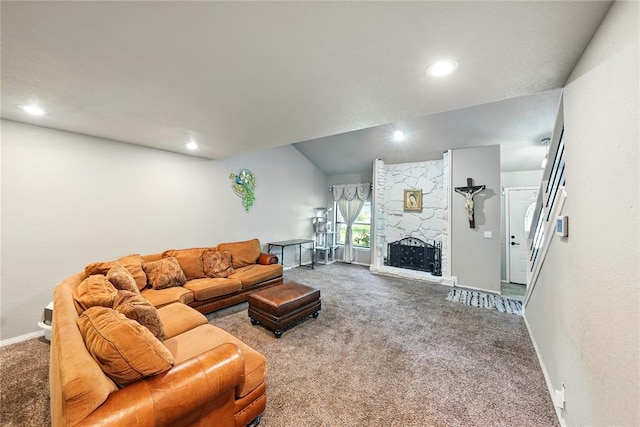 5029 NW 24th Pl, Oklahoma City, OK 73127 - carpeted living area with lofted ceiling, a stone fireplace, baseboards, and recessed lighting