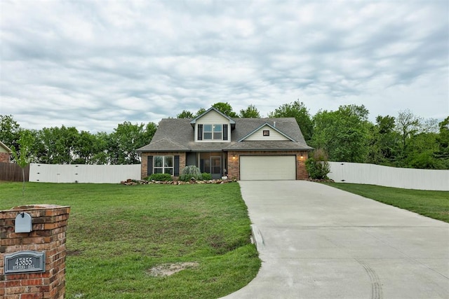 43855 Hunters Hill Dr, Shawnee, OK 74801 - view of front of property with concrete driveway, brick siding, and a garage