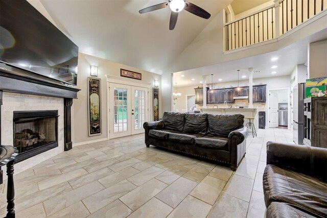 43855 Hunters Hill Dr, Shawnee, OK 74801 - living area featuring a ceiling fan, high vaulted ceiling, a fireplace, french doors, and recessed lighting