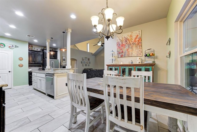 43855 Hunters Hill Dr, Shawnee, OK 74801 - dining room with ceiling fan, a chandelier, and arched walkways