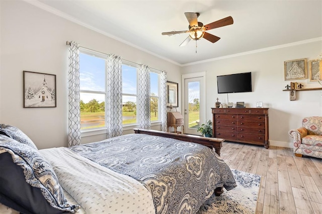 bedroom featuring crown molding, wood-type flooring, a ceiling fan, baseboards, and access to exterior