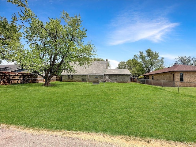 view of yard featuring a fenced backyard