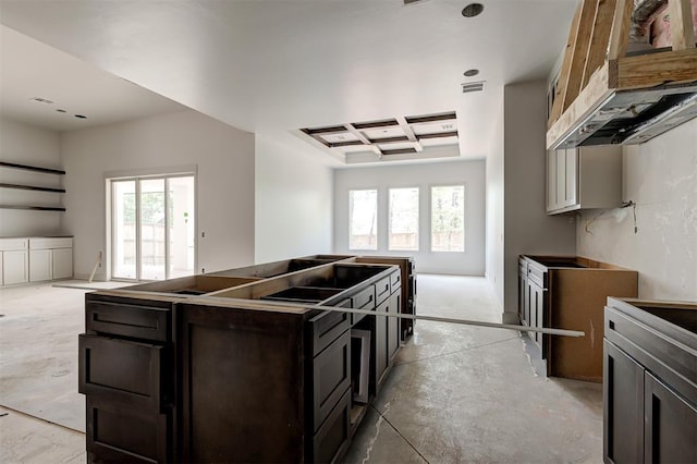 3825 Stone Hill Ln, Edmond, OK 73034 - kitchen with unfinished concrete floors, coffered ceiling, visible vents, dark brown cabinetry, and open floor plan