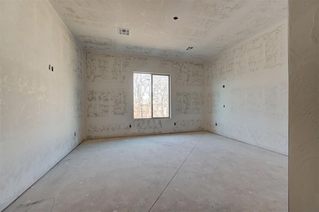 3825 Stone Hill Ln, Edmond, OK 73034 - spare room with visible vents and concrete flooring
