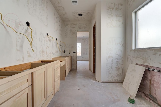 3825 Stone Hill Ln, Edmond, OK 73034 - hall featuring concrete flooring and visible vents