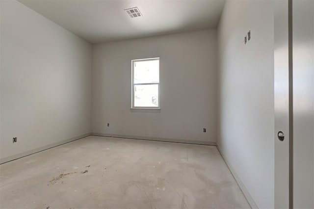 3825 Stone Hill Ln, Edmond, OK 73034 - spare room featuring unfinished concrete floors, baseboards, and visible vents