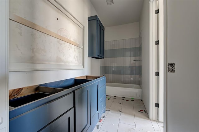 3825 Stone Hill Ln, Edmond, OK 73034 - bathroom featuring tile patterned floors and  shower combination