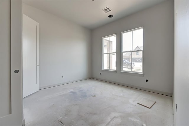 3825 Stone Hill Ln, Edmond, OK 73034 - empty room featuring baseboards, visible vents, and unfinished concrete flooring