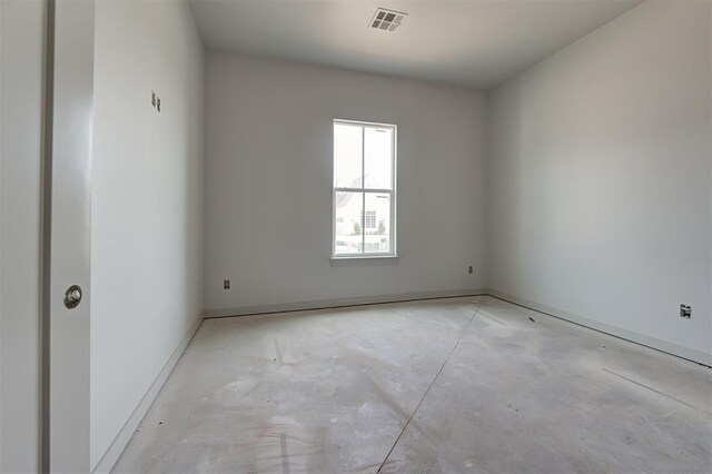 3825 Stone Hill Ln, Edmond, OK 73034 - empty room with concrete floors, visible vents, and baseboards