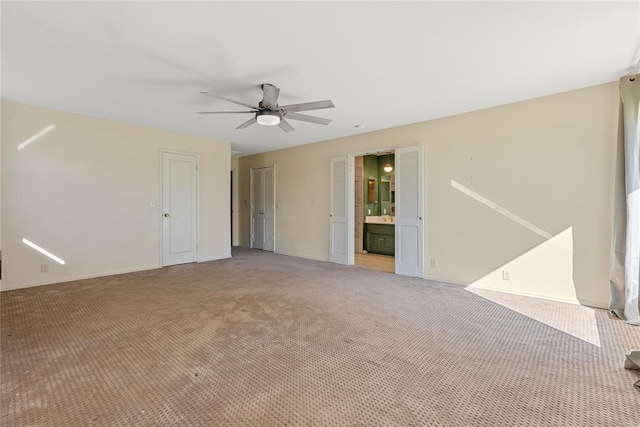 12600 Green Valley Dr, Oklahoma City, OK 73120 - unfurnished room with light colored carpet, ceiling fan, and baseboards
