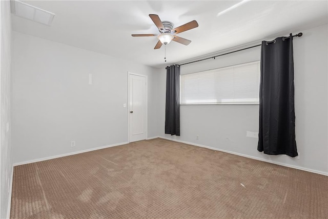 12600 Green Valley Dr, Oklahoma City, OK 73120 - carpeted spare room featuring visible vents, baseboards, and ceiling fan