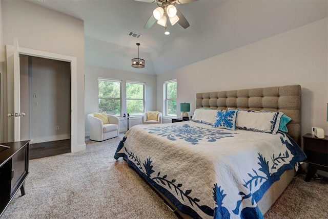 bedroom featuring vaulted ceiling, baseboards, visible vents, carpet, and ceiling fan
