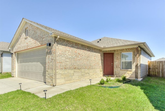 single story home with an attached garage, driveway, brick siding, and a shingled roof
