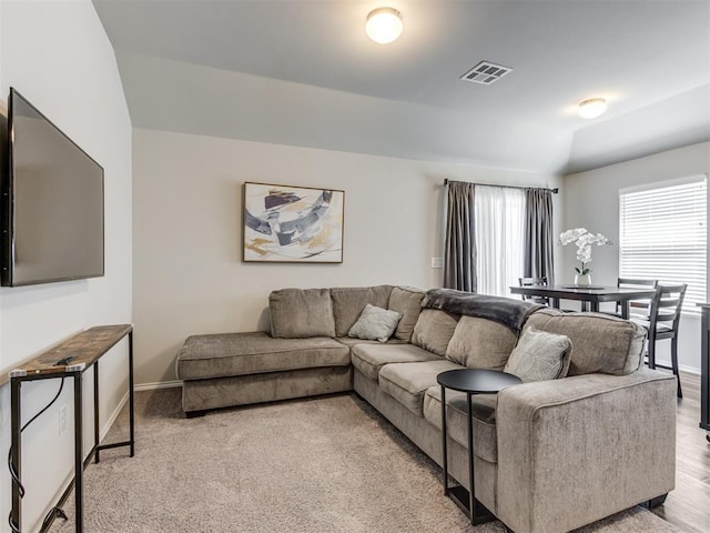 living room featuring baseboards