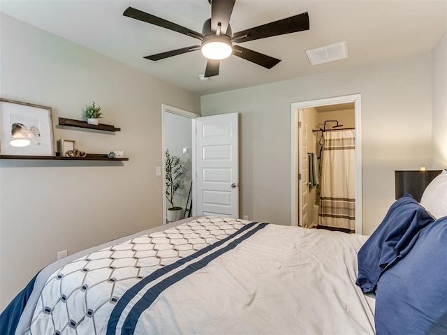 bedroom featuring a ceiling fan and ensuite bathroom