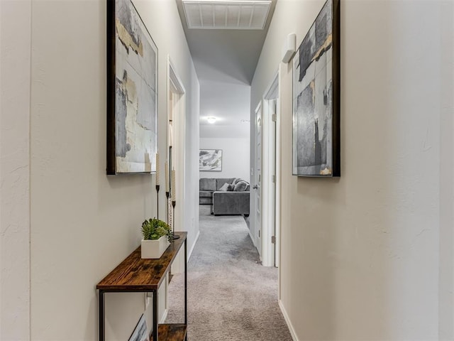 hall featuring carpet floors
