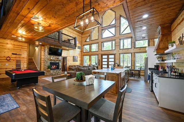 dining space featuring wooden ceiling, dark wood-type flooring, pool table, and plenty of natural light