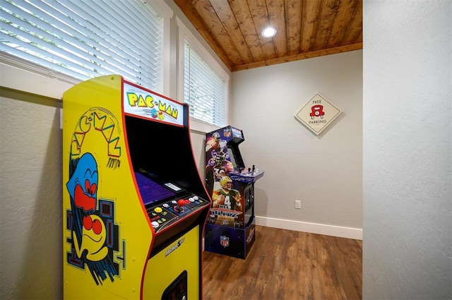 game room with wood ceiling, baseboards, and wood finished floors