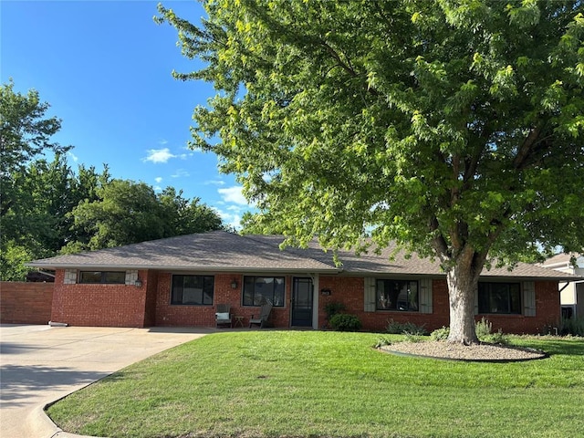 2813 Clermont Pl, Oklahoma City, OK 73116 - single story home featuring brick siding and driveway