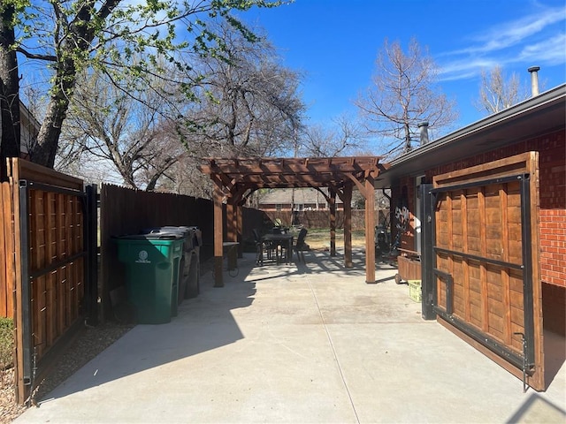 2813 Clermont Pl, Oklahoma City, OK 73116 - view of patio featuring outdoor dining space, a pergola, and a fenced backyard