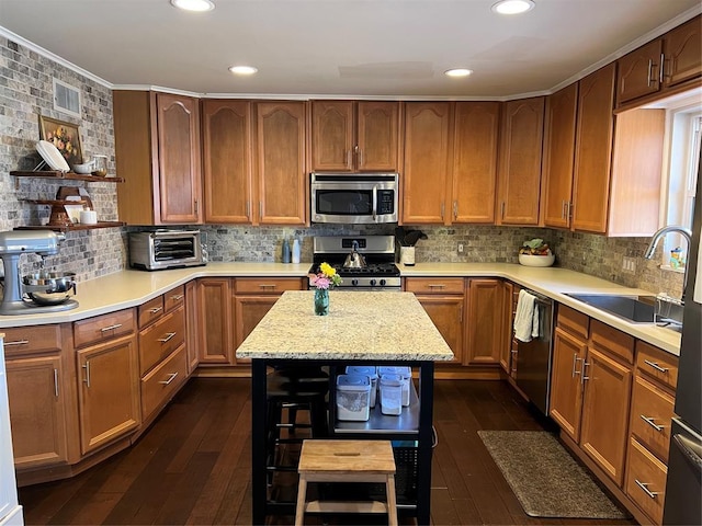 2813 Clermont Pl, Oklahoma City, OK 73116 - kitchen featuring stainless steel appliances, open shelves, dark wood-style flooring, ornamental molding, and decorative backsplash