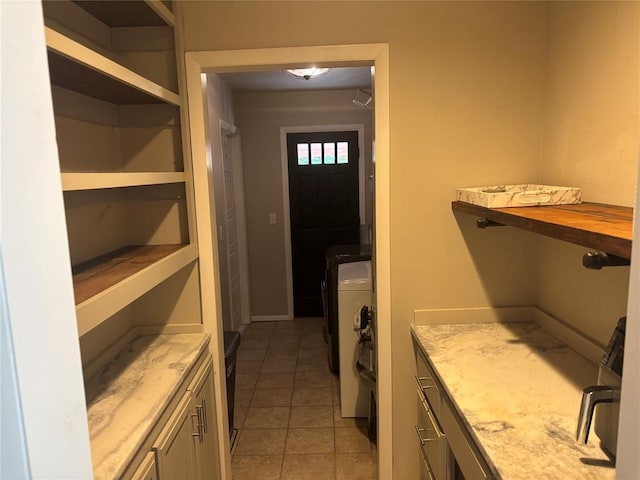2813 Clermont Pl, Oklahoma City, OK 73116 - laundry area with light tile patterned floors