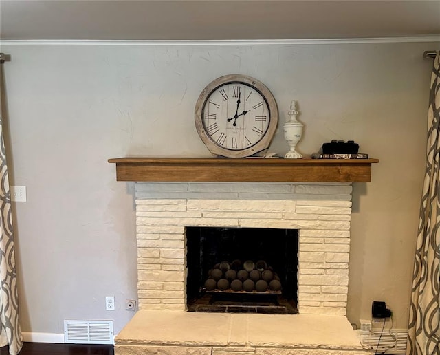 2813 Clermont Pl, Oklahoma City, OK 73116 - detailed view of a brick fireplace, crown molding, and baseboards