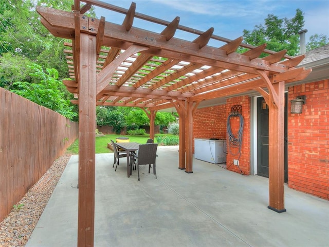 2813 Clermont Pl, Oklahoma City, OK 73116 - fenced backyard with outdoor dining area, a pergola, and a patio
