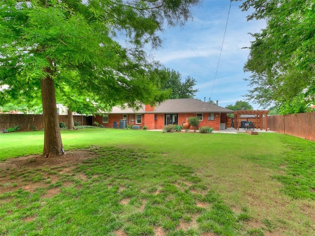 2813 Clermont Pl, Oklahoma City, OK 73116 - fenced backyard with a pergola and a patio area