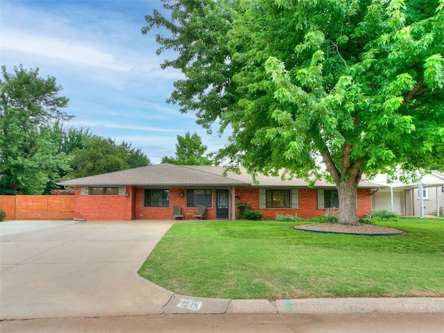 2813 Clermont Pl, Oklahoma City, OK 73116 - ranch-style home with brick siding and driveway