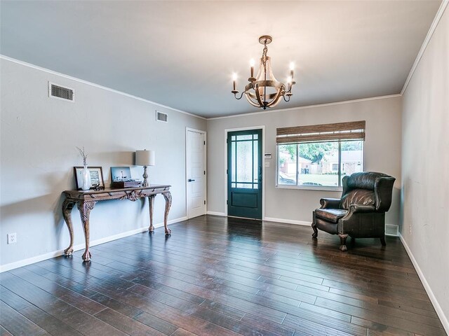 2813 Clermont Pl, Oklahoma City, OK 73116 - living area featuring a chandelier, wood-type flooring, and crown molding
