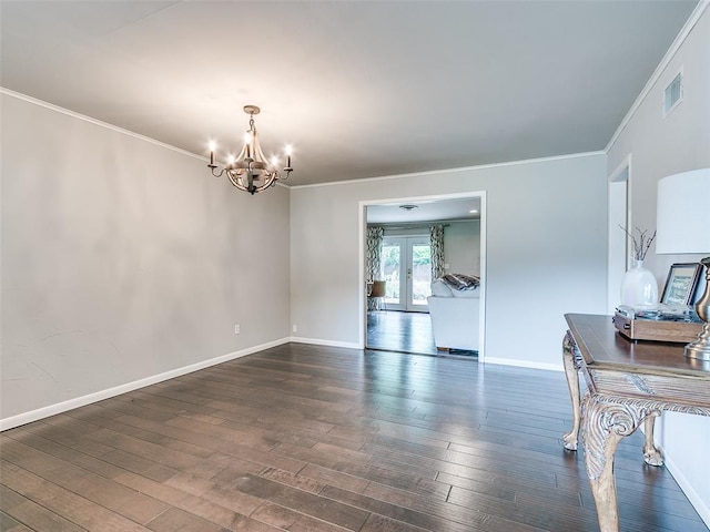 2813 Clermont Pl, Oklahoma City, OK 73116 - spare room with french doors, a chandelier, ornamental molding, and wood-type flooring