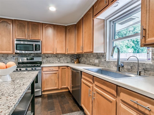 2813 Clermont Pl, Oklahoma City, OK 73116 - kitchen with appliances with stainless steel finishes, dark wood finished floors, light countertops, backsplash, and recessed lighting