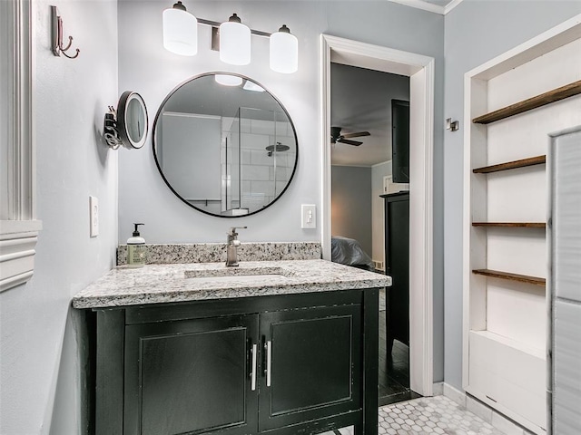 2813 Clermont Pl, Oklahoma City, OK 73116 - bathroom with ceiling fan, vanity, built in shelves, and tile patterned floors
