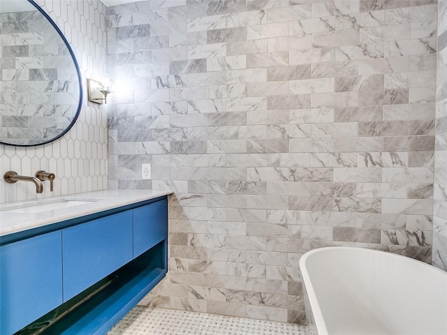 2813 Clermont Pl, Oklahoma City, OK 73116 - full bathroom featuring vanity, a freestanding tub, and tile walls