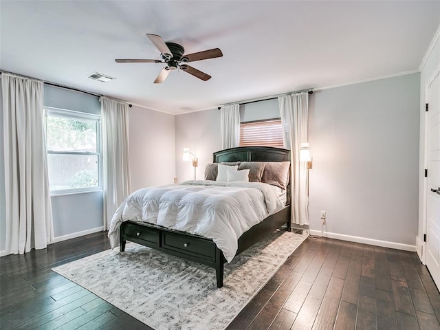 2813 Clermont Pl, Oklahoma City, OK 73116 - bedroom with dark wood-type flooring, crown molding, and a ceiling fan