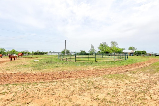 19206 Coker Rd, Shawnee, OK 74801 - view of yard featuring a rural view, an outdoor structure, and an exterior structure