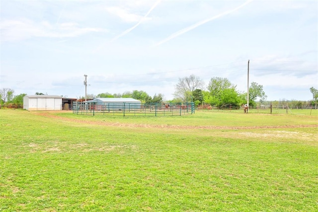 19206 Coker Rd, Shawnee, OK 74801 - view of yard with a rural view, an outbuilding, a pole building, and fence